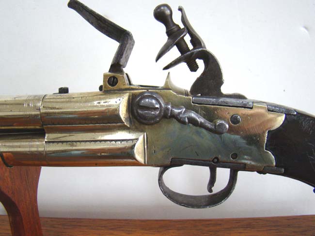 A Unique large 18th century brass barrel tap action four barrel flintlock volley pistol — image 3